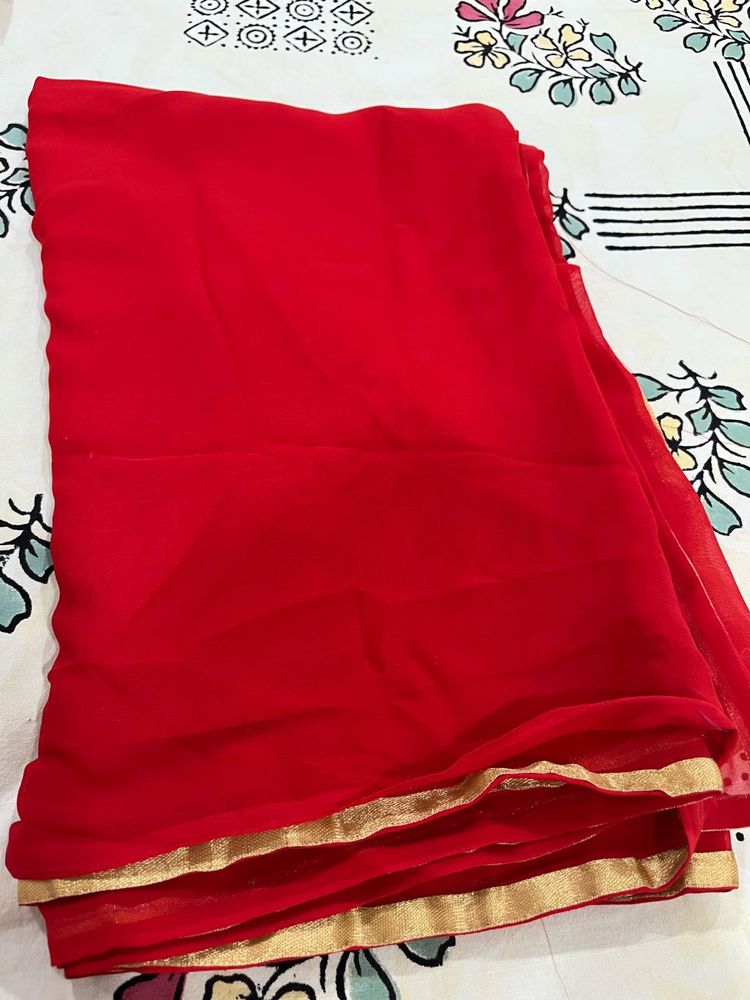 Vibrant Red Saree with Golden Border