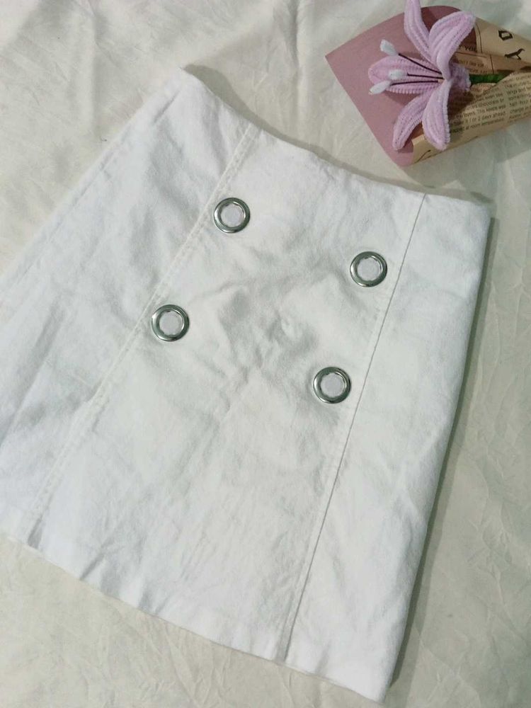 Chic White Mini Skirt with Grommet Detail