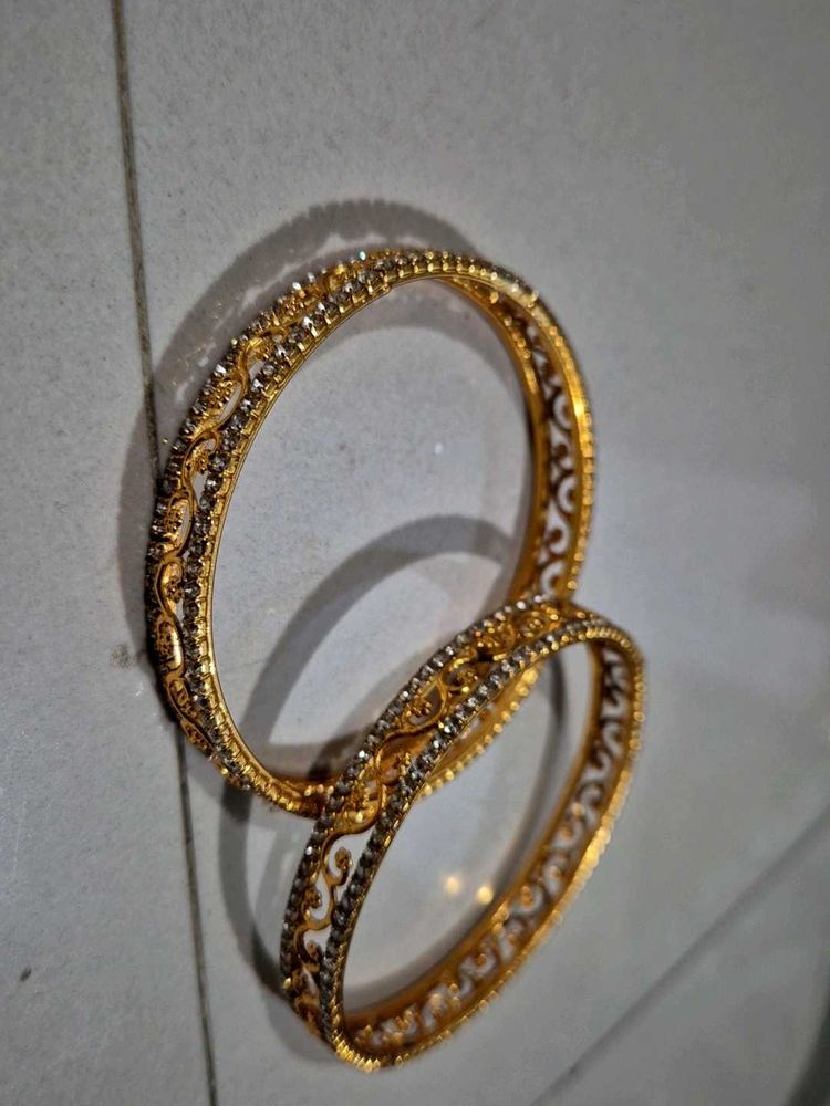 Exquisite Gold Bangles with Intricate Design