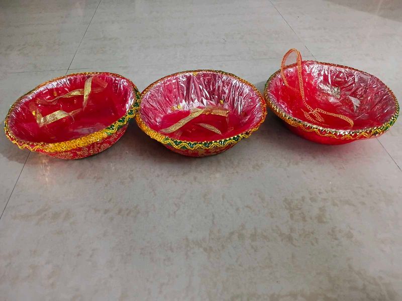4 Decorative baskets for gifting or festive use.