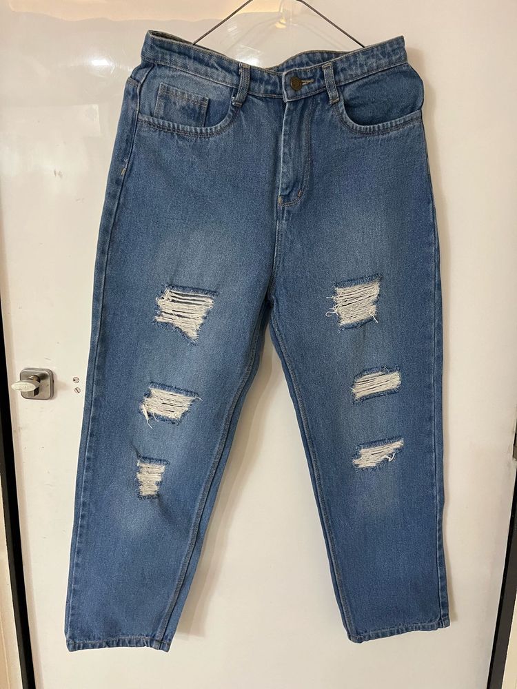 Distressed Blue Denim Jeans