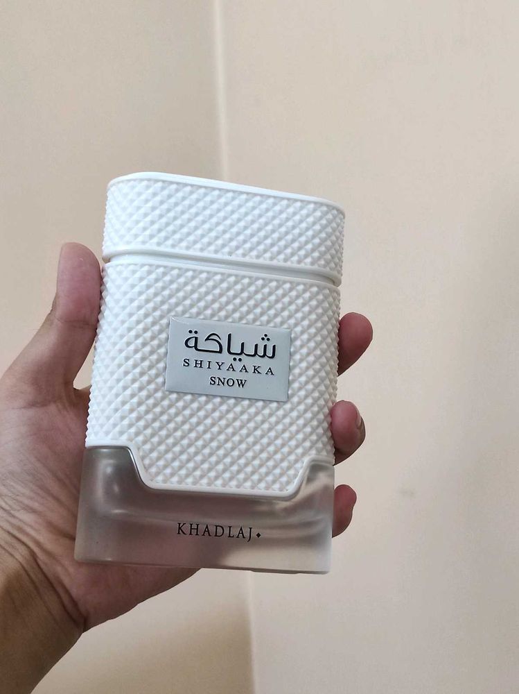 Empty bottle of Khadlaj Shiyaaka Snow Perfume