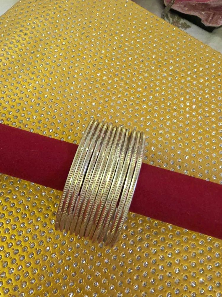 12 Set of Elegant Silver Bangles