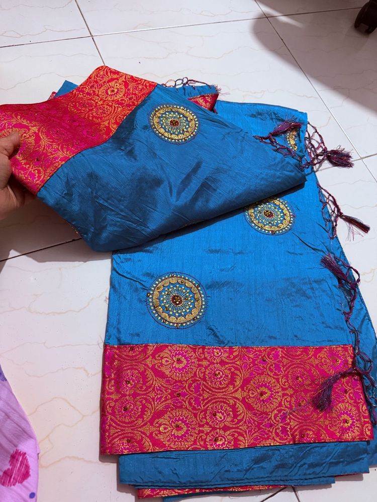 Beautiful Blue Saree with Pink Border