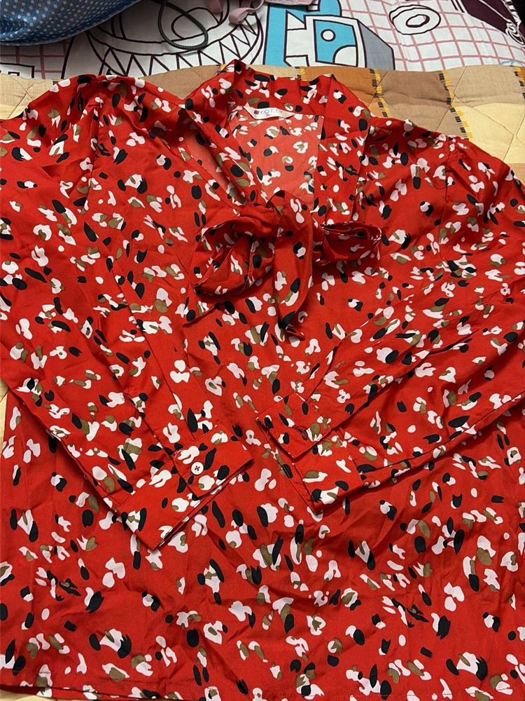 Chic Red Abstract Print Blouse with Bow