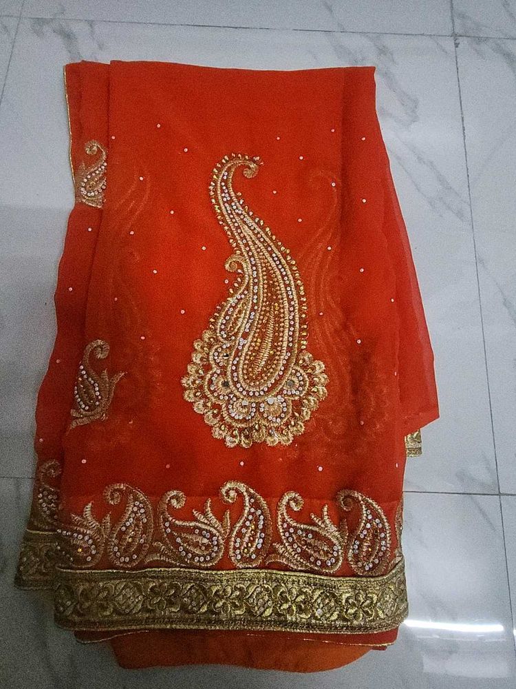 Elegant Orange Embroidered Saree
