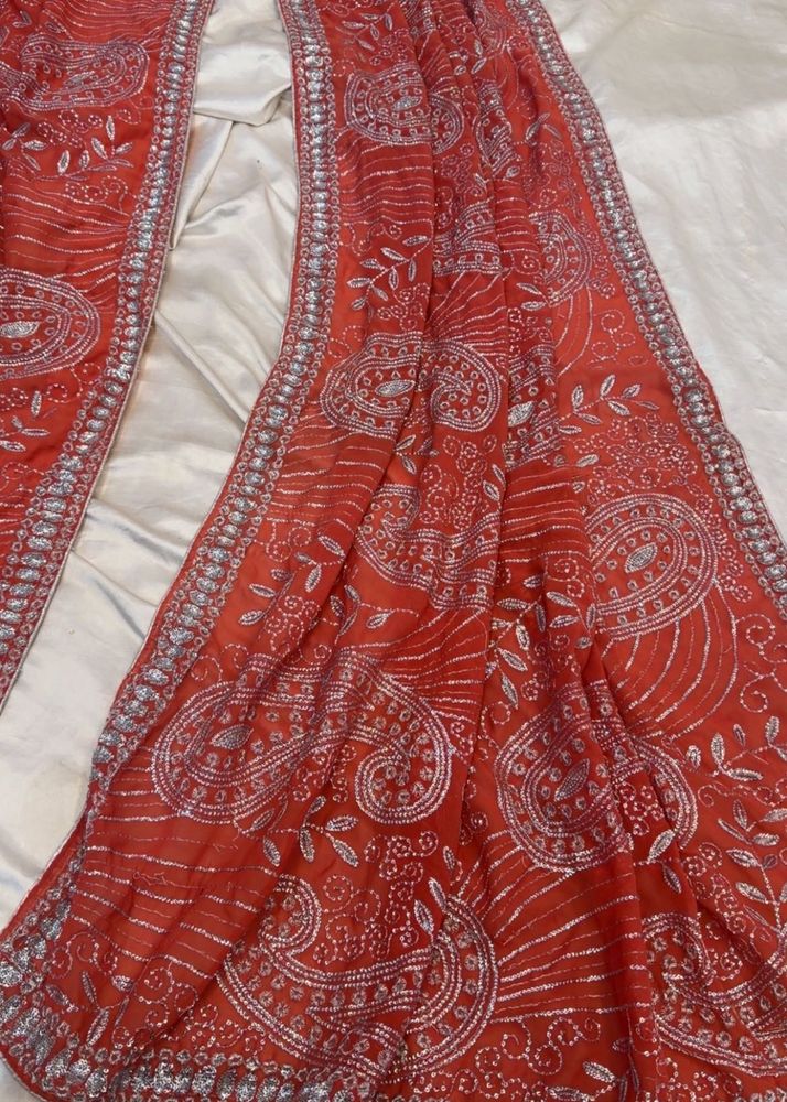 peachy red Saree with Silver Embellishme