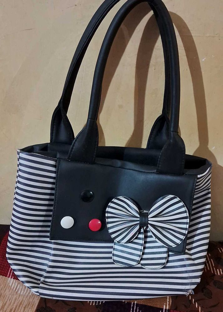 Chic Striped Tote Bag with Bow Accent
