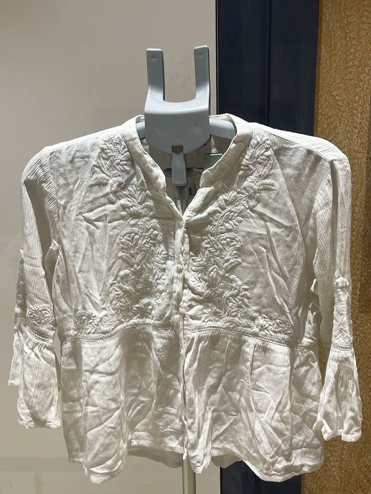 White Embroidered Peplum Top
