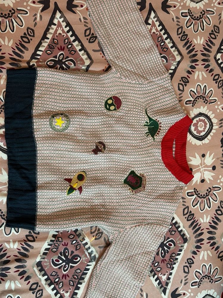 Whimsical Patched Sweater