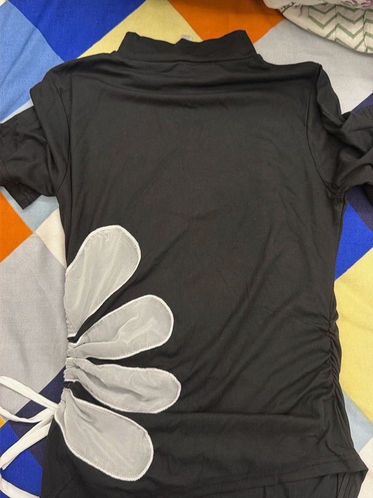 Chic Black Ruched Top with Floral Detail