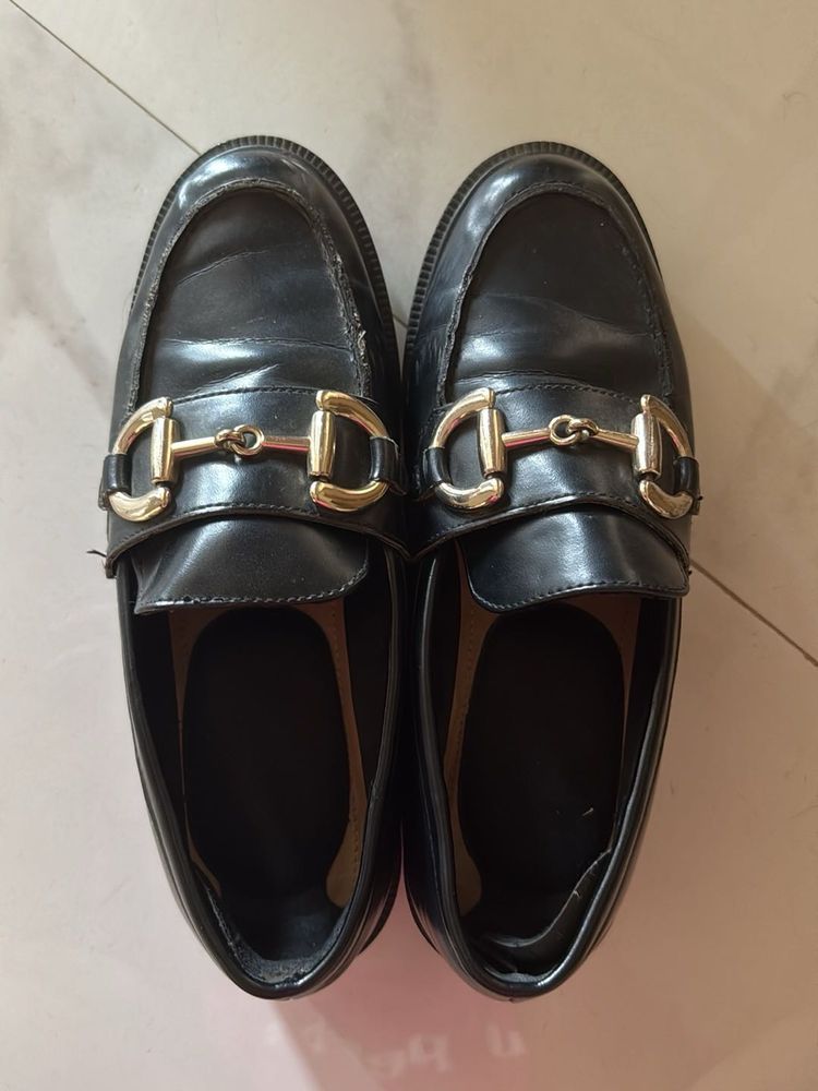 Classic Black Loafers with Gold Buckle