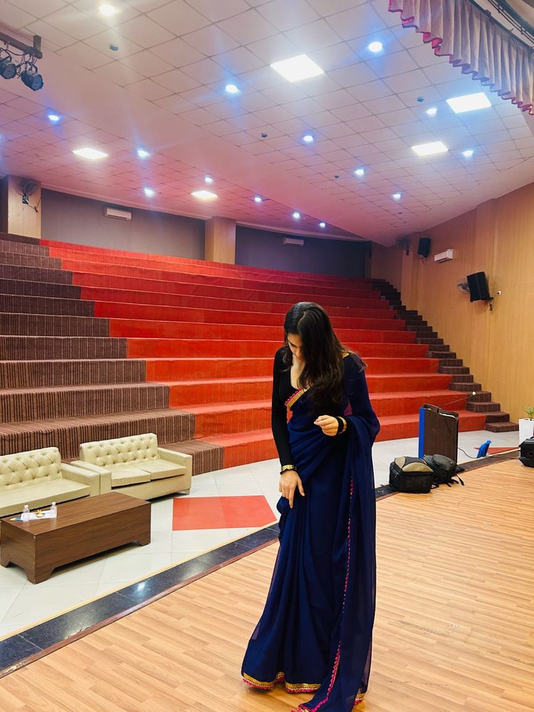 Elegant Navy Blue Saree with Pink Border