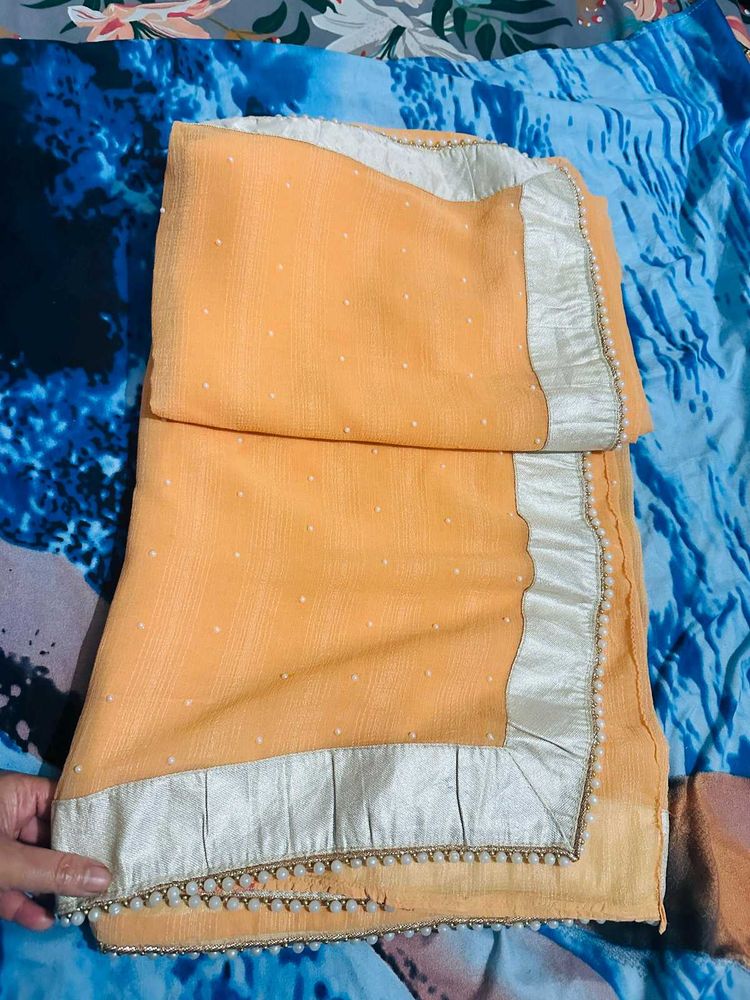 Peach Saree with Silver moti border