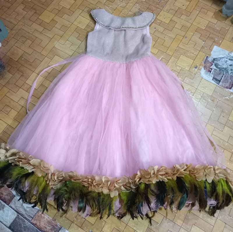 Sparkling Pink Tulle Gown with Feather Trim