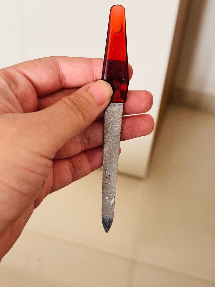 Nail File with Red Handle