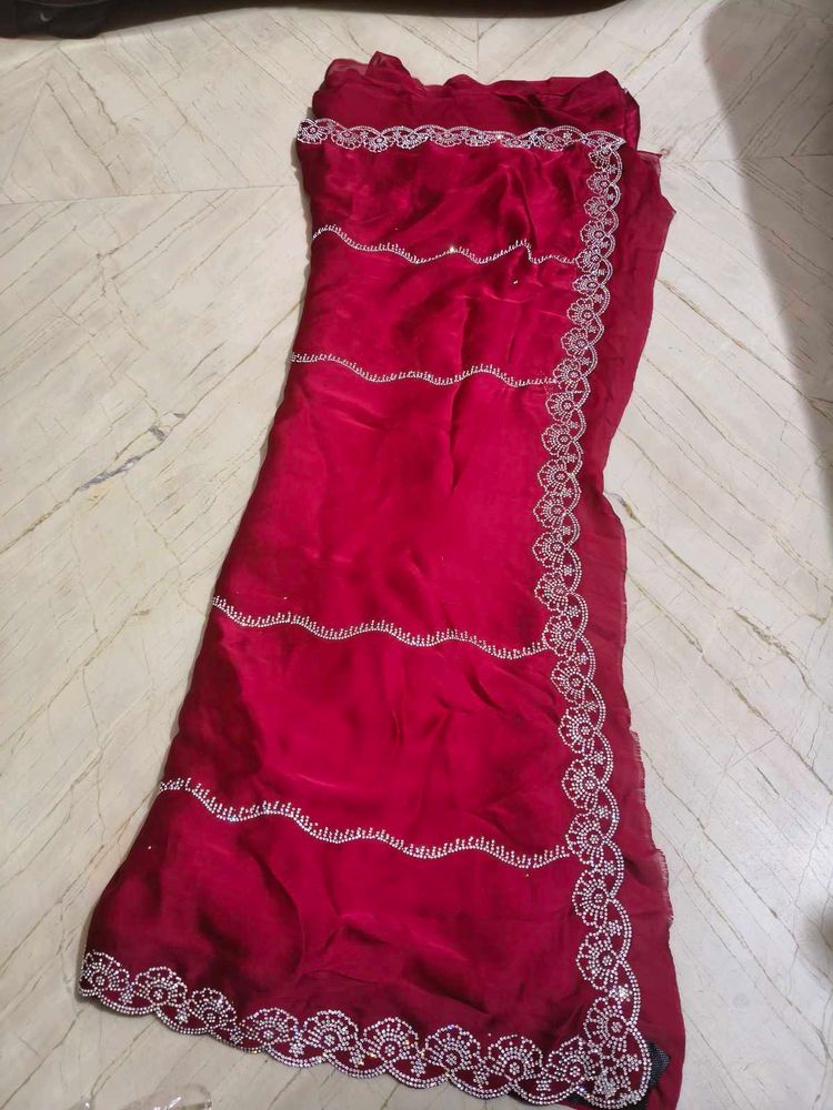 Elegant Red Saree with Embellished Border