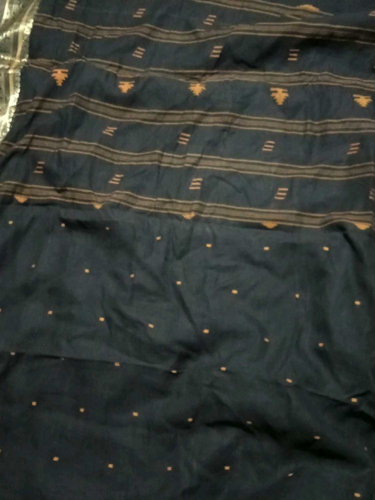 Elegant Dark Saree with Subtle Patterns