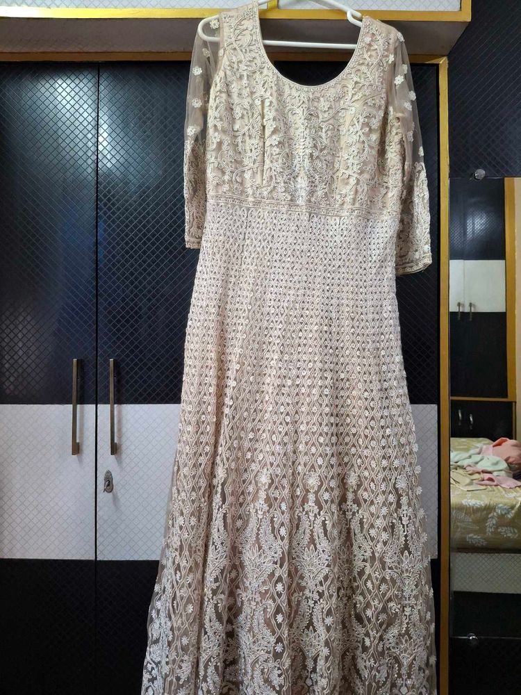 Elegant Beige Embroidered Anarkali gown