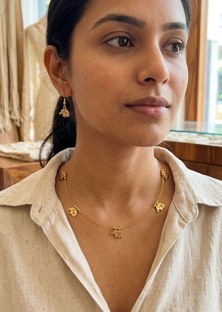 Handmade Invisible necklace with small elephant pe