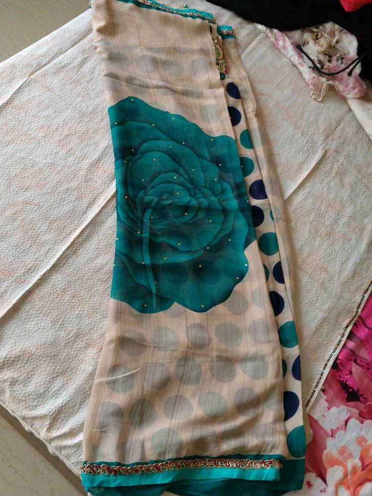 Elegant Cream &amp; Teal Floral Saree
