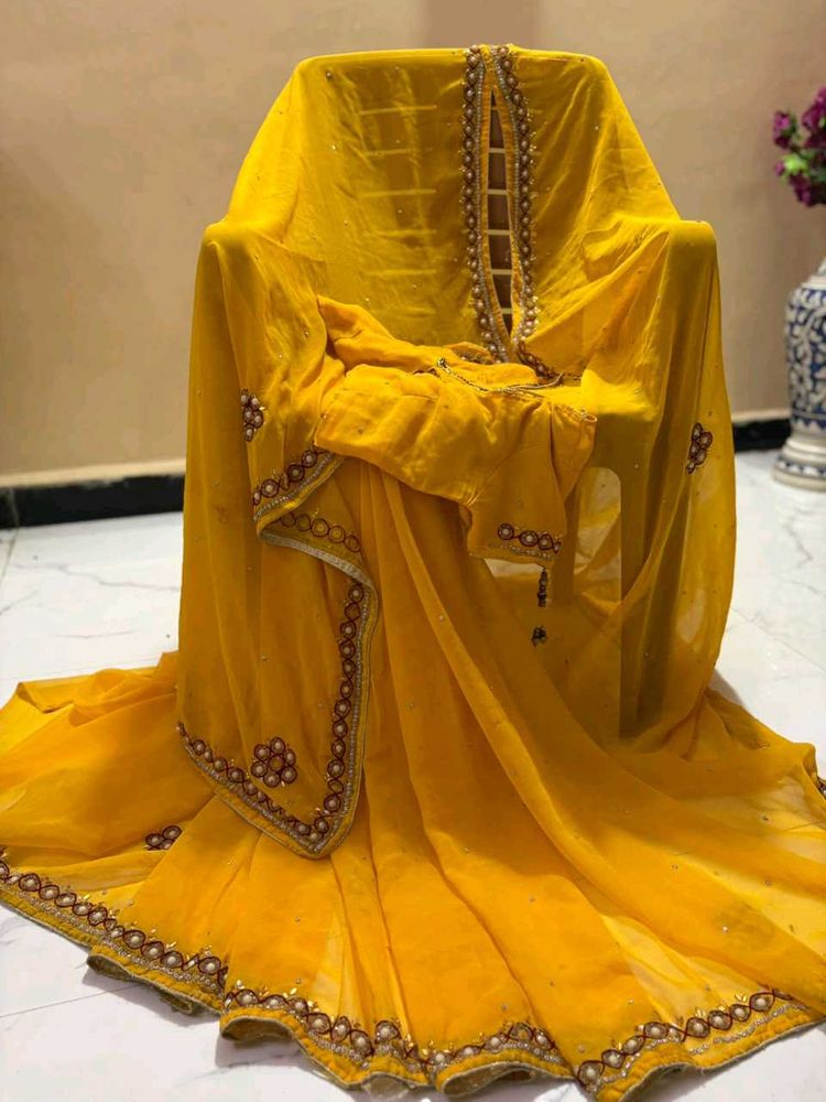Beautiful Yellow pearl handwork saree