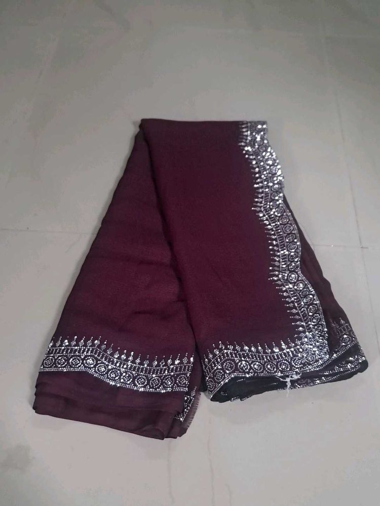 Elegant Maroon Saree with Silver Embellishments