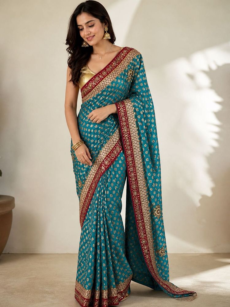 Stunning Teal Saree with Golden &amp; Red Border