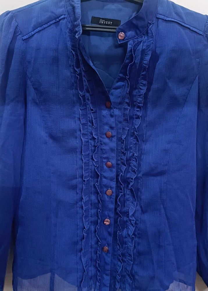 Blue Ruffled Button-Up shirt