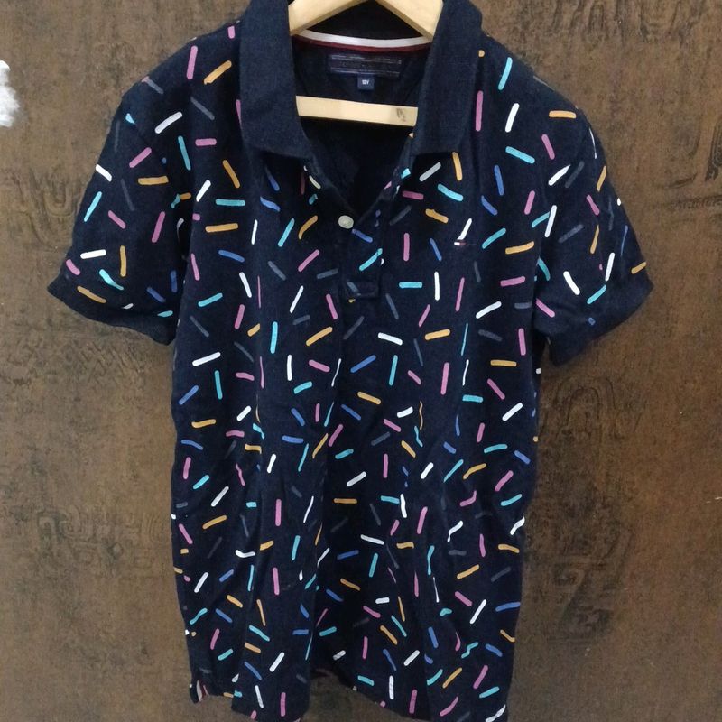 Tommy Hilfiger custom polo t-shirt for Boys, age 6 to 7yrs. black color with color full lines.