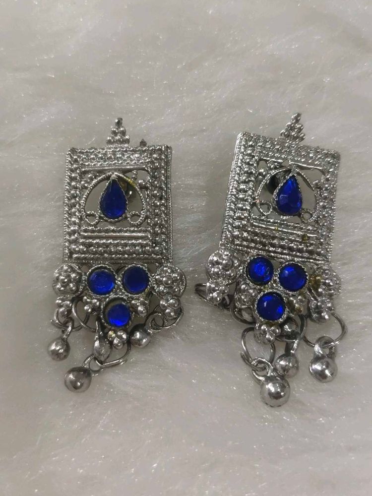Silver Jhumka Earrings with Blue Stones