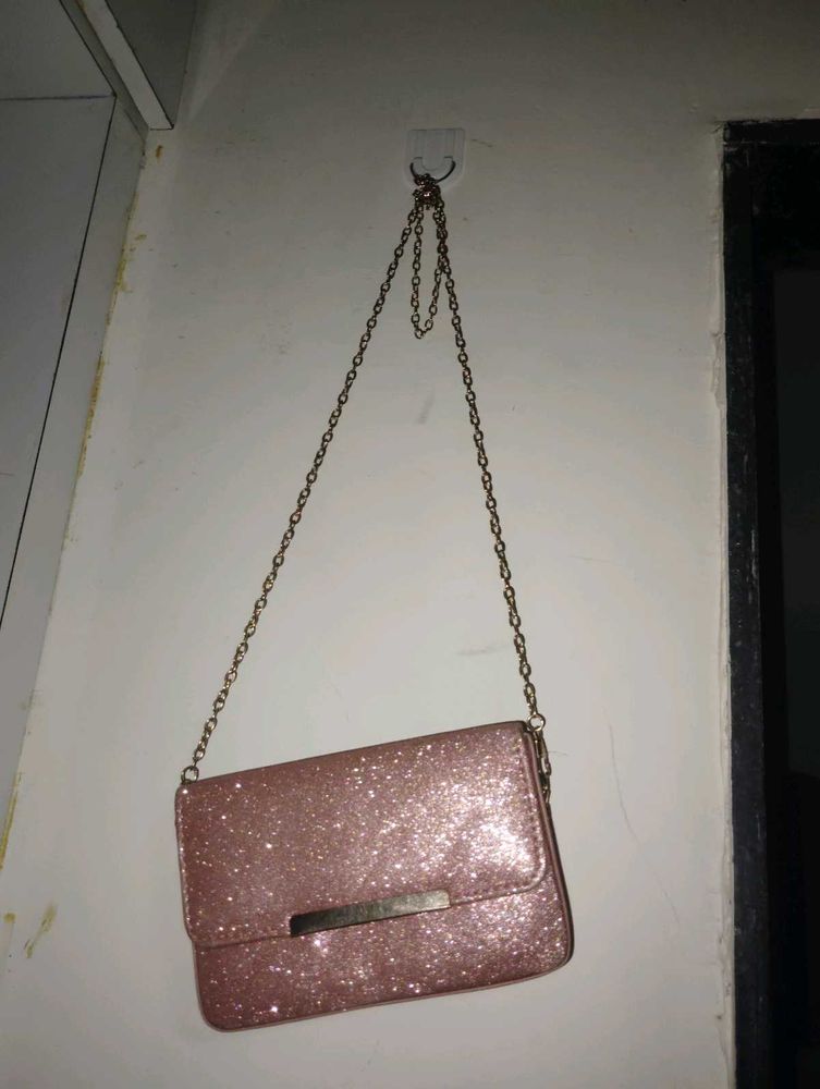 Rose gold sling bag
