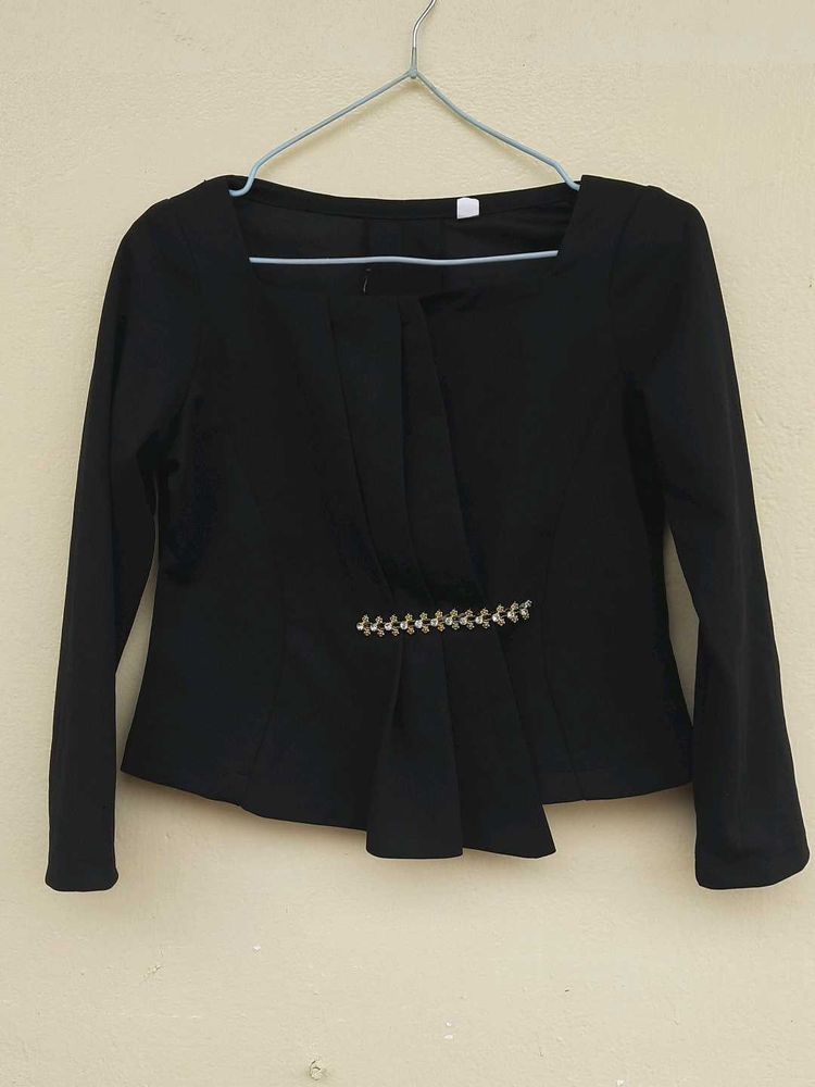 Elegant Black Peplum Top with Embellishments