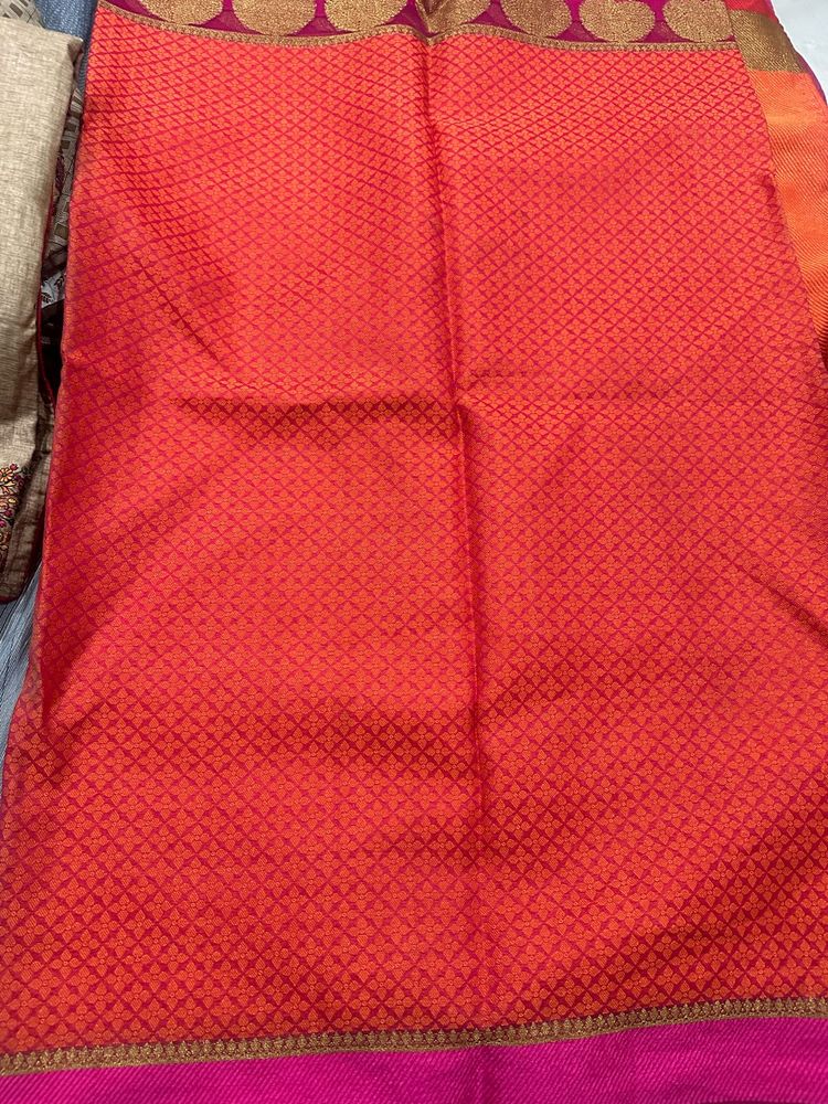Vibrant Red Saree with Intricate Pattern