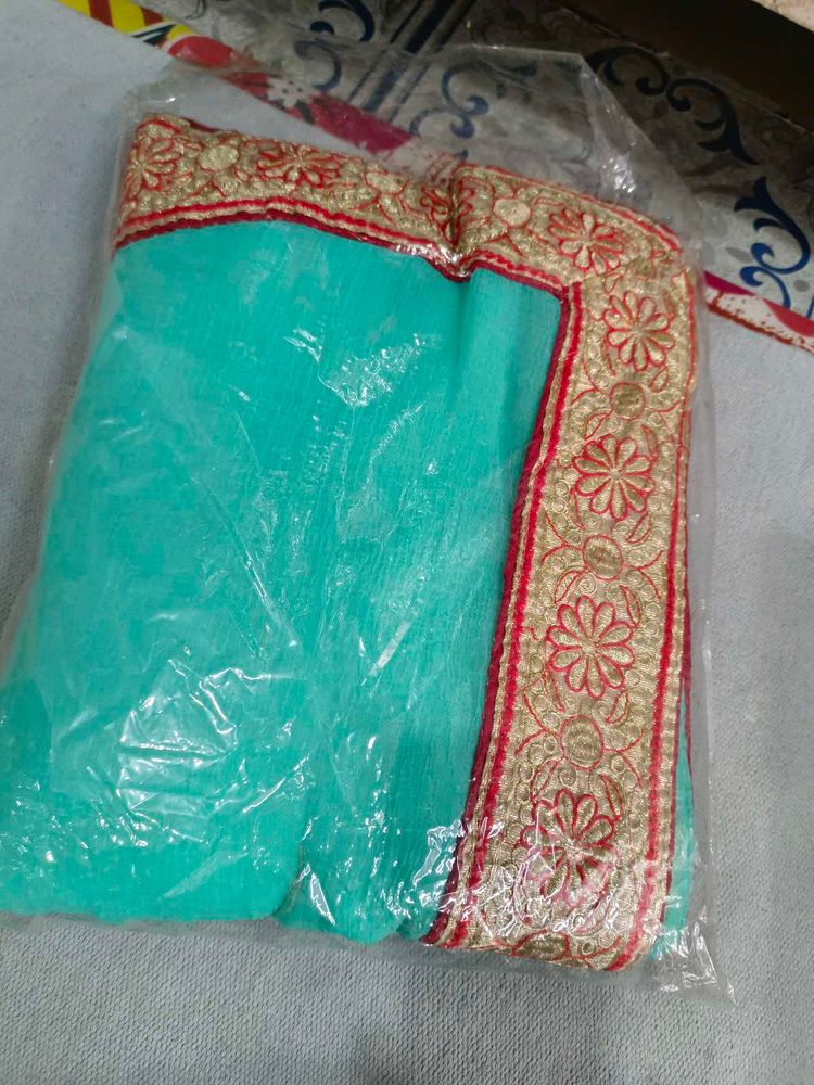 Beautiful Teal Saree with Embroidered Border