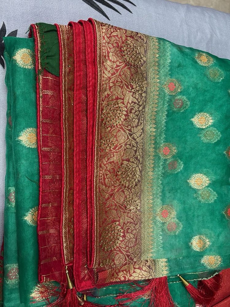 Elegant Green Silk Saree with Gold Border