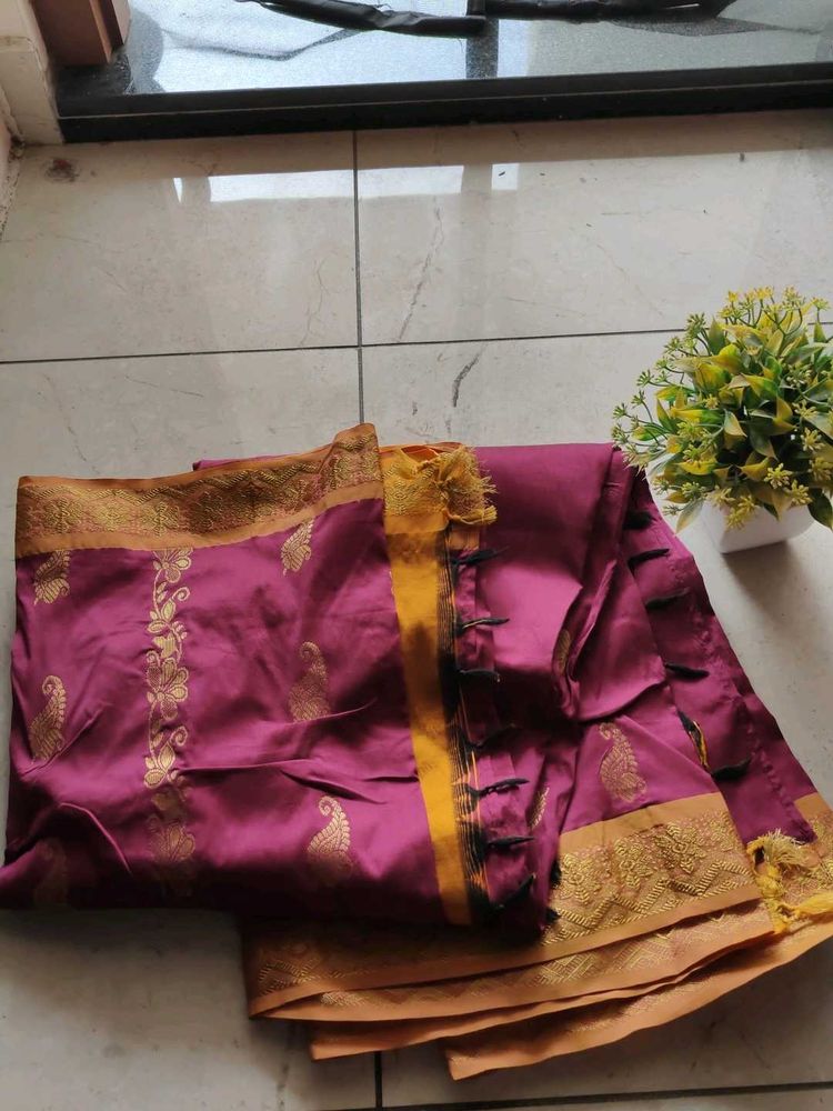 Elegant Maroon Saree with Gold Border