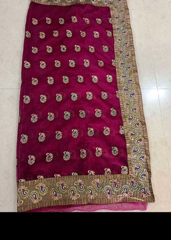 Stunning Magenta Embroidered Saree