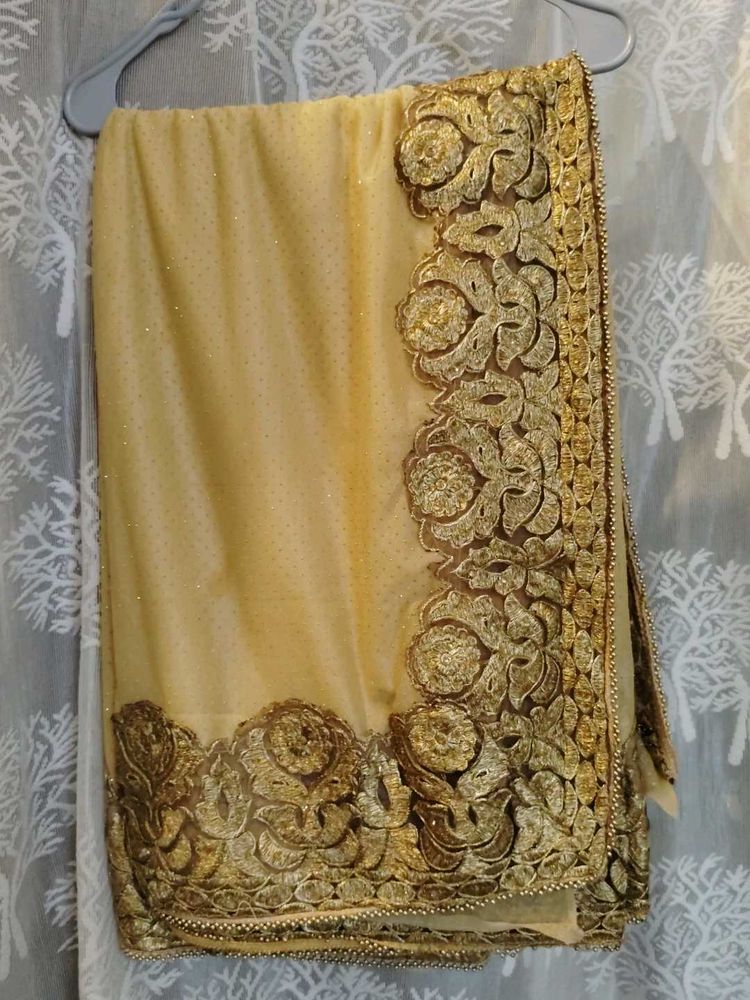 Elegant Golden Embroidered Saree