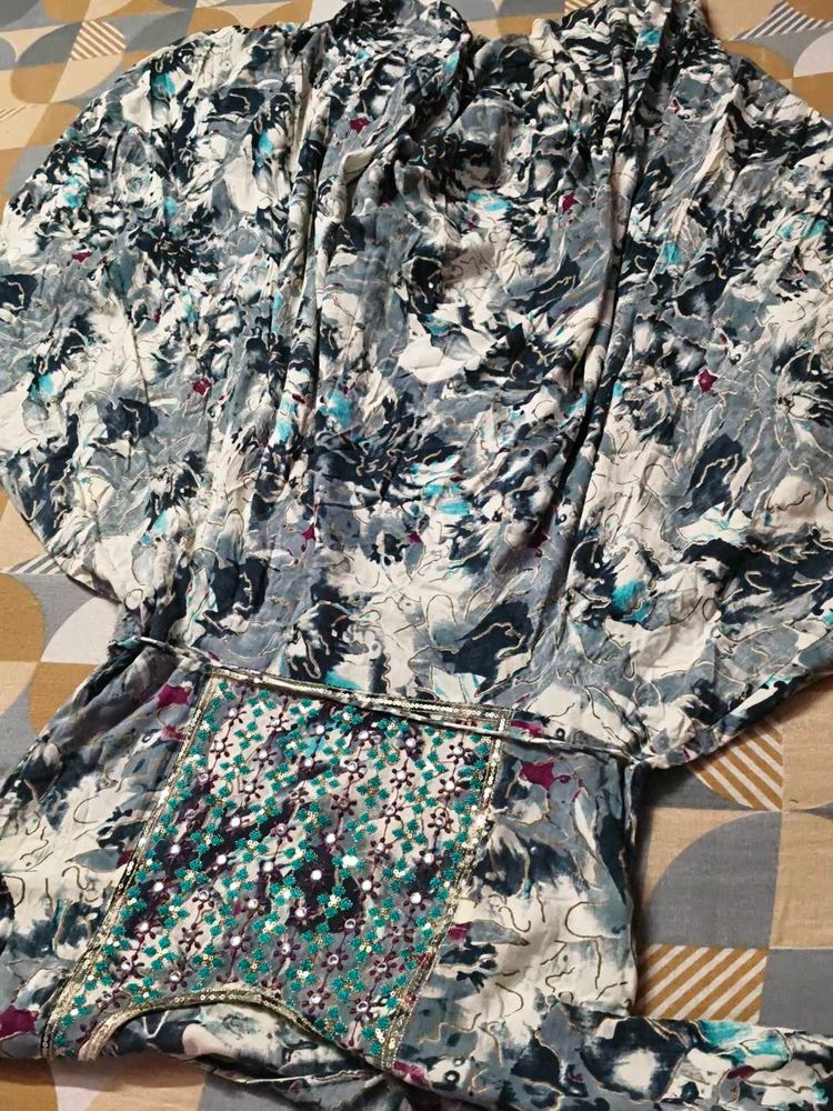 Designer Kurta Set with Embellished Neckline
