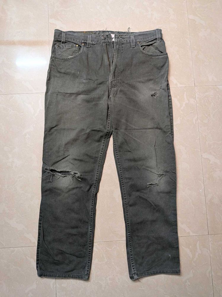 Distressed Levi's Denim Jeans