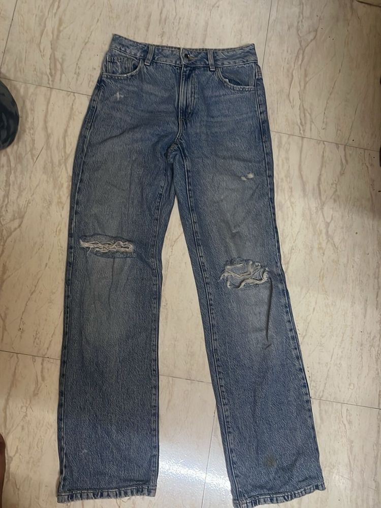Distressed Blue Denim Jeans
