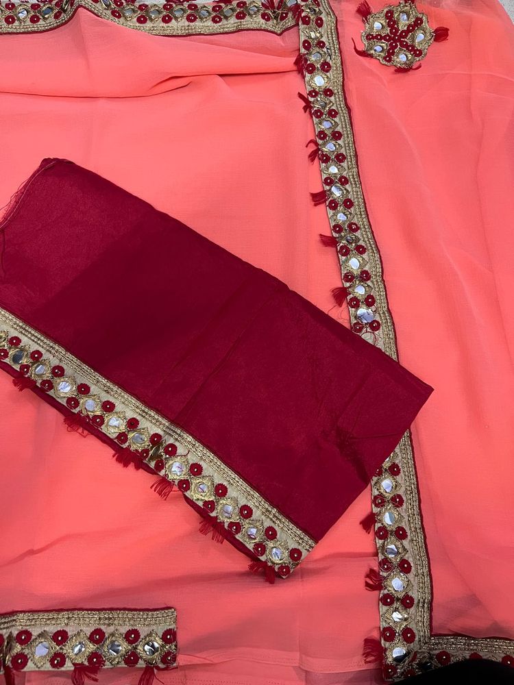 Elegant Coral Saree with Mirror Work