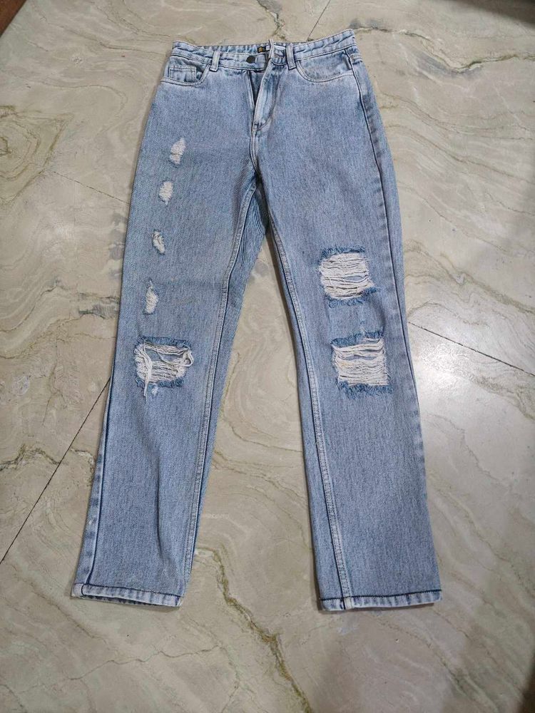 Ripped Light Wash Denim Jeans
