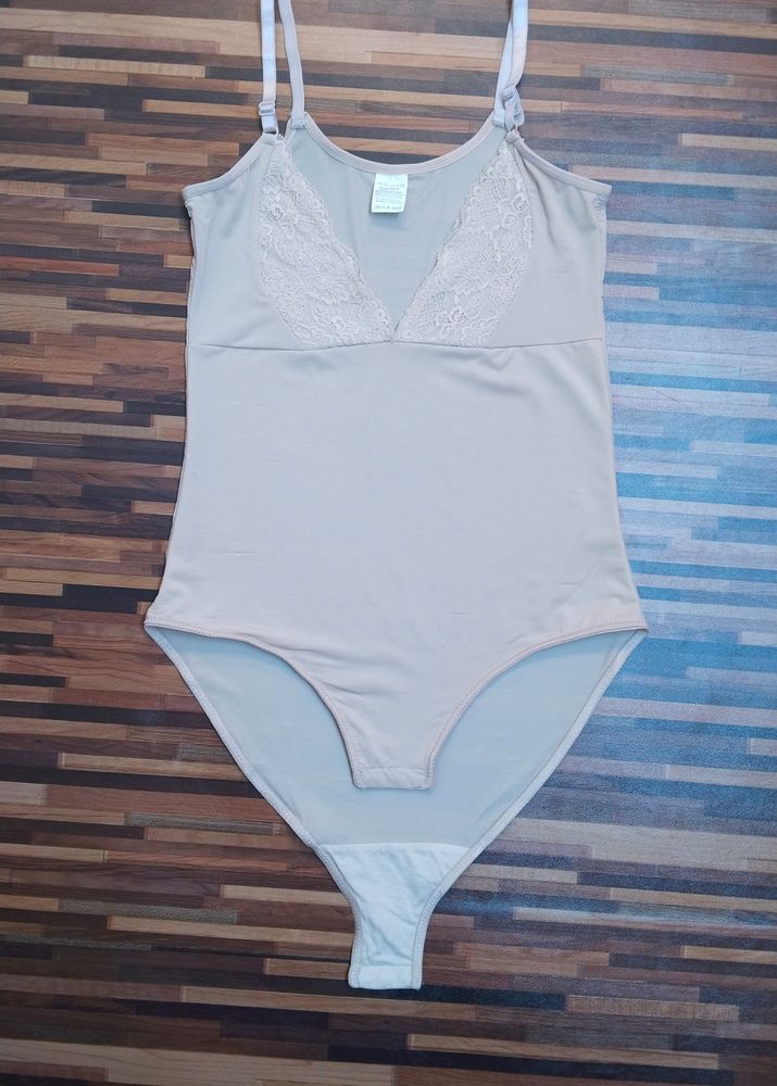 Elegant Nude Bodysuit With Lace Neck Line