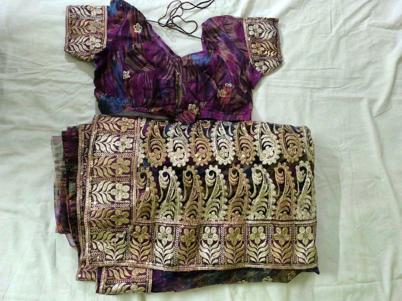 Elegant Embroidered net Saree with Blouse Set