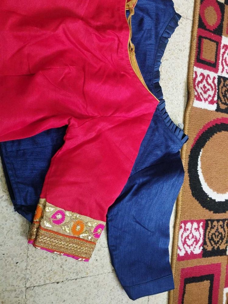 Vibrant Pink Blouse with Blue Sleeves