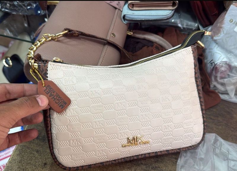 michael kors sling bag with tag and branding