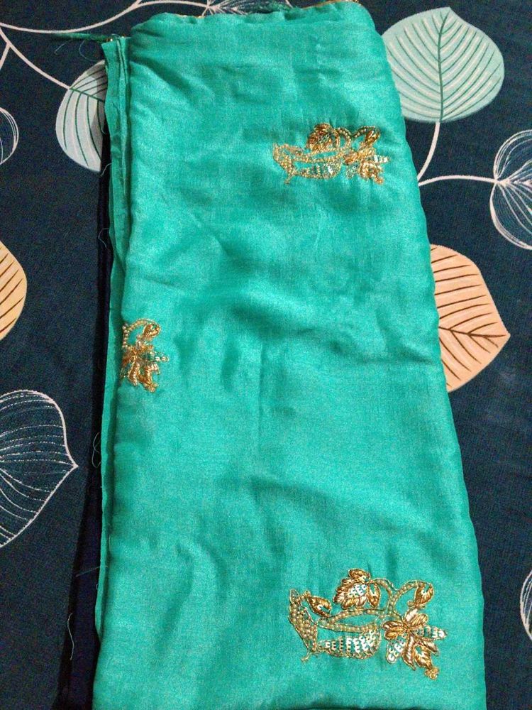 Elegant Teal Saree with Gold Embroidery