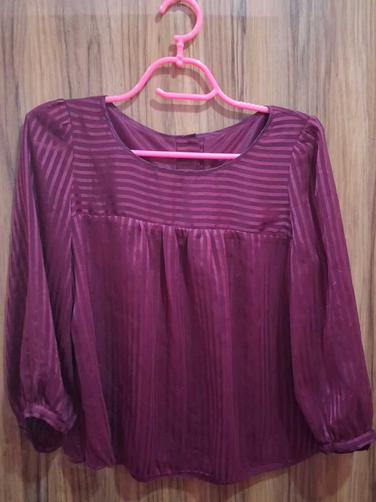 Stylish Burgundy Blouse with Striped Detail